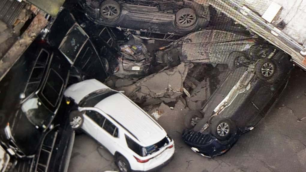 A parking garage collapsed Tuesday in lower Manhattan’s Financial District, killing one worker, injuring five, and crushing cars as concrete floors fell on top of each other.