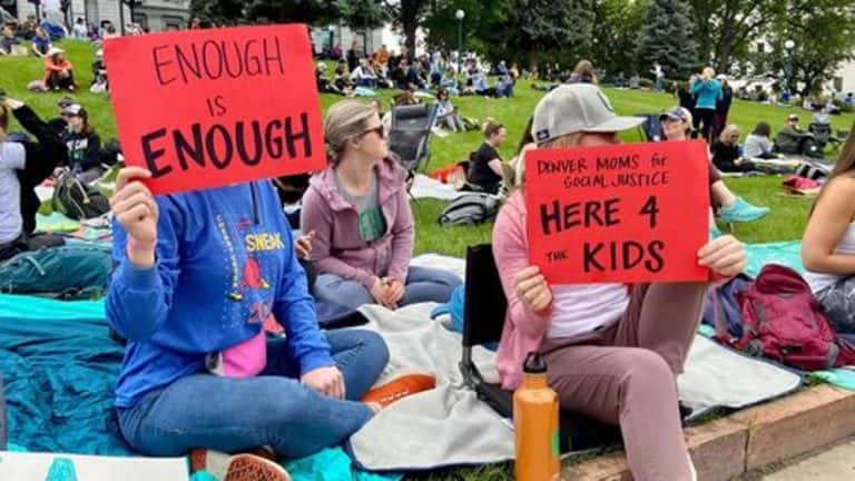 Following a call from women of color to utilize their “privilege” to call for action against gun violence, dozens of White women gathered at the Colorado Capitol