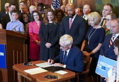 Wisconsin Governor Tony Evers Signs A Bipartisan Bill To Stop Milwaukee From Going Bankrupt