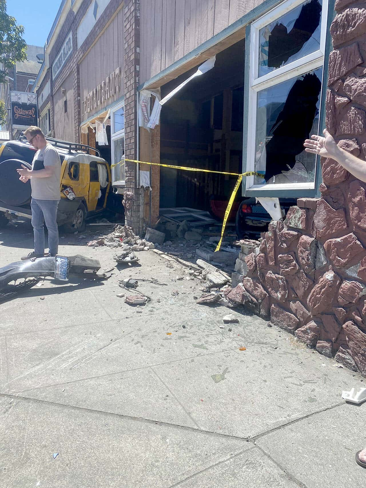 Port Angeles police reports a three-car crash that send cars into a building