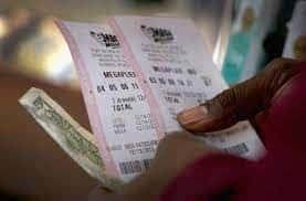 Mega Million Jackpot Hits $910M- How Much Will The Winner Get After Taxes? 