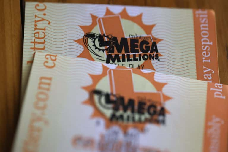 America's Biggest Lottery Winner Emerges from Neptune Beach