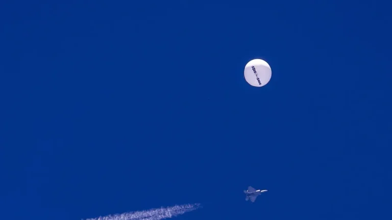 Over the western US, the military monitors a high-altitude balloon