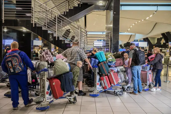 Leaving Everything Behind: 49 Afrikaner Refugees Land in U.S. Amid Political Firestorm Leaving Everything Behind: 49 Afrikaner Refugees Land in U.S. Amid Political Firestorm