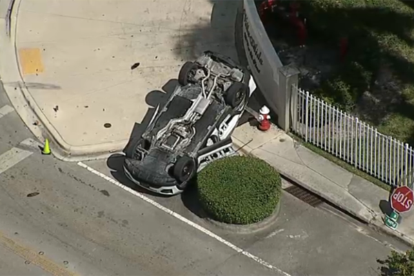 Hialeah Police Officer Hospitalized After Cruiser Flips in Crash: Expected to Be OK Hialeah Police Officer Hospitalized After Cruiser Flips in Crash: Expected to Be OK